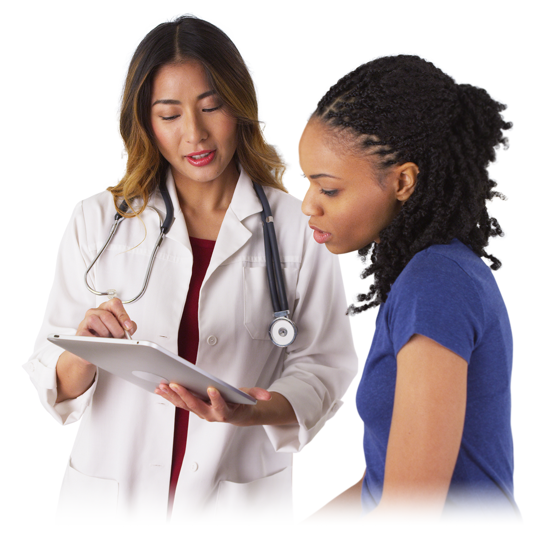 Photograph of an Asian, female doctor speaking with an African American woman with systemic sclerosis. 