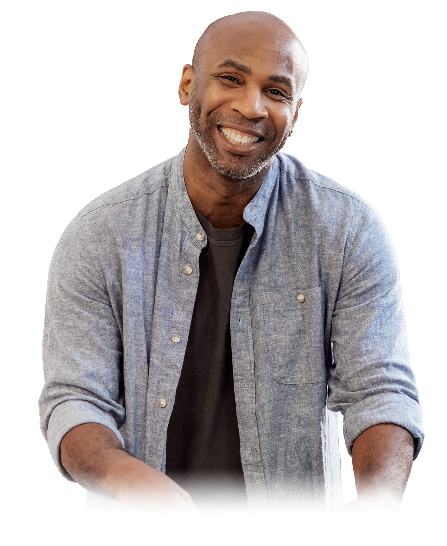 Photograph of an Asian, female doctor speaking with an African American woman with systemic sclerosis. 